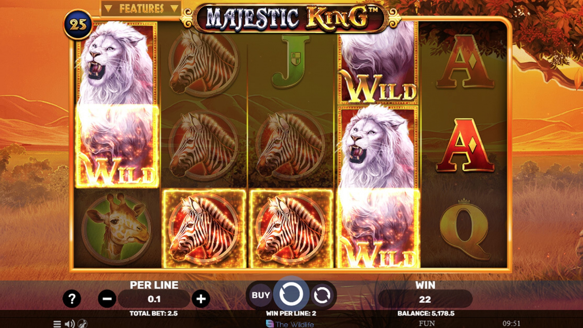 Majestic King Slot Base Game - Stacked Wilds and Big Wins Base game of Majestic King slot by Spinomenal, showcasing the stacked wilds feature on a 5-reel, 25-payline setup.