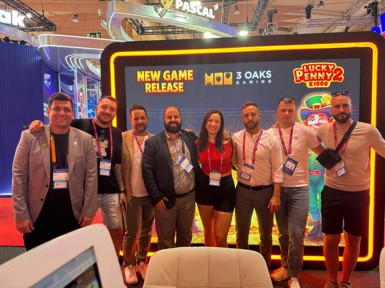 Timeless Tech and 3Oaks Gaming teams together at the SBC Lisbon exhibition, showcasing partnership and LATAM collaboration.