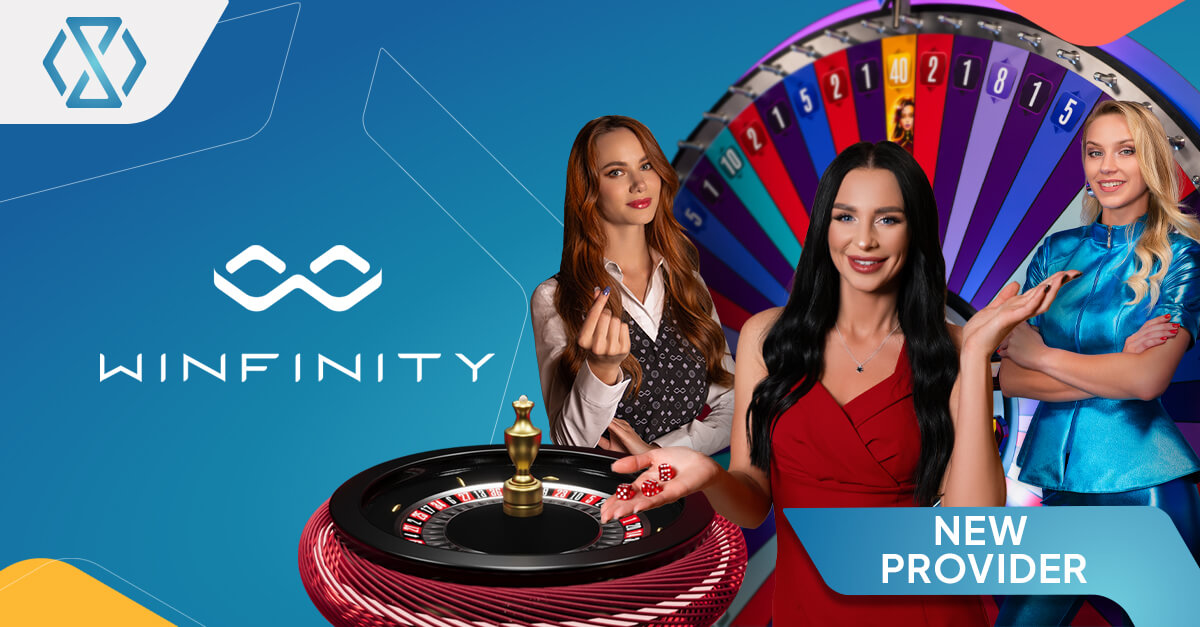 Promotional banner showing Winfinity live casino dealers with roulette wheel and gaming studio setup, announcing Winfinity as a new provider integrated into the Timeless Tech iGaming Game Aggregator.